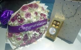 Purple boquet mixed with white crysanthemums by blessline flowers